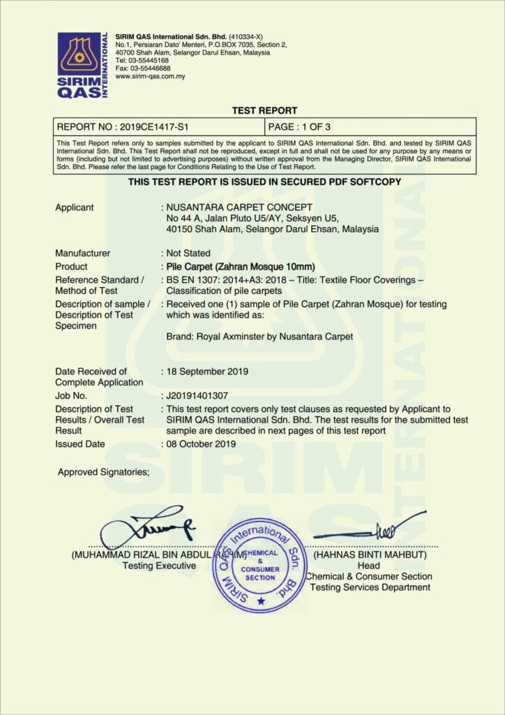 Dokumen rasmi helaian pertama laporan ujian SIRIM QAS International bertajuk Test Report nombor 2019CE1417-S1 bertarikh 08 Oktober 2019 bagi produk Pile Carpet Zahran Mosque 10mm di bawah jenama Royal Axminster by Nusantara Carpet, lengkap dengan tanda tangan Muhammad Rizal Bin Abdul Rahman selaku Testing Executive serta Hahnas Binti Mahbut selaku Head Chemical and Consumer Section berserta cop biru bulat SIRIM QAS International Sdn Bhd di bahagian bawah
